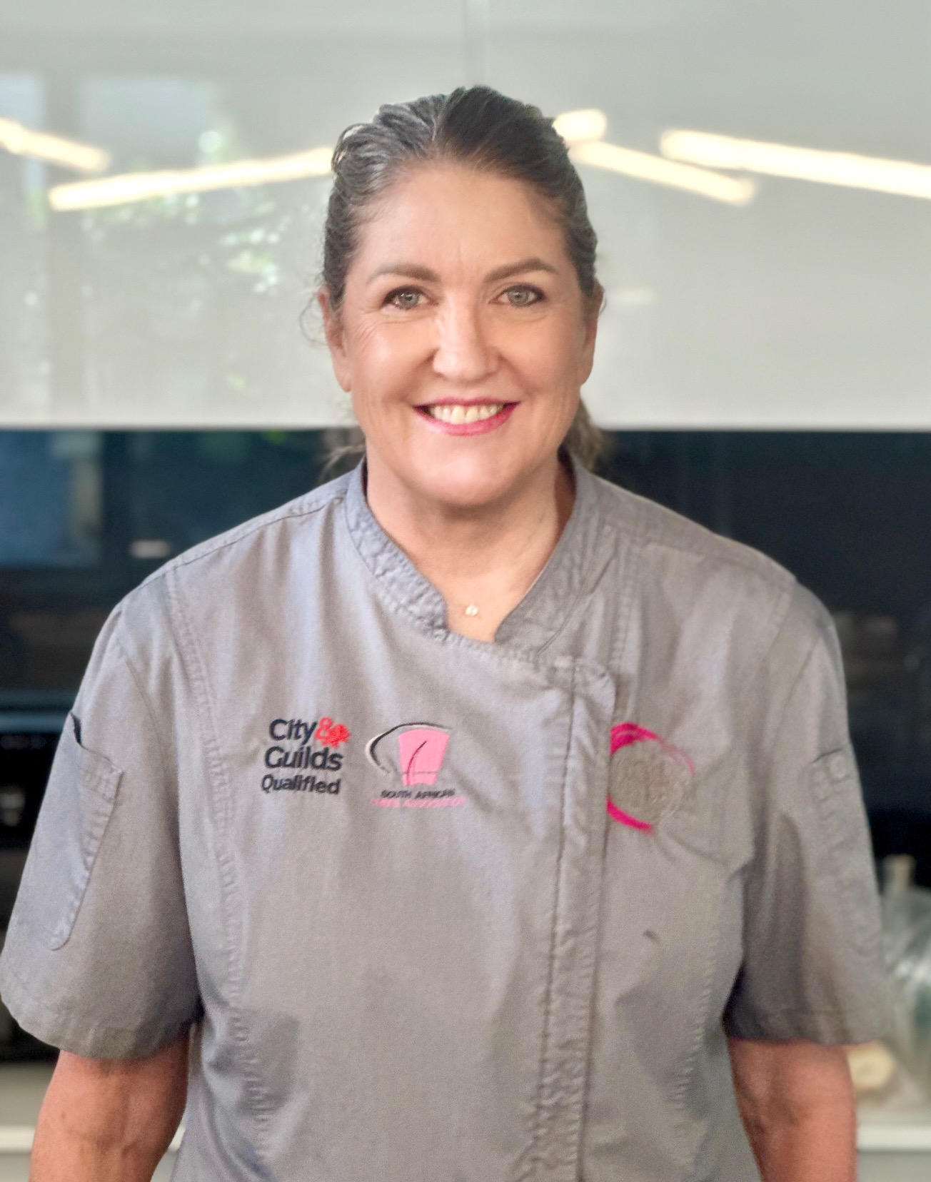 Chef Anni, founder of Kitchen Addiction, in her chef whites