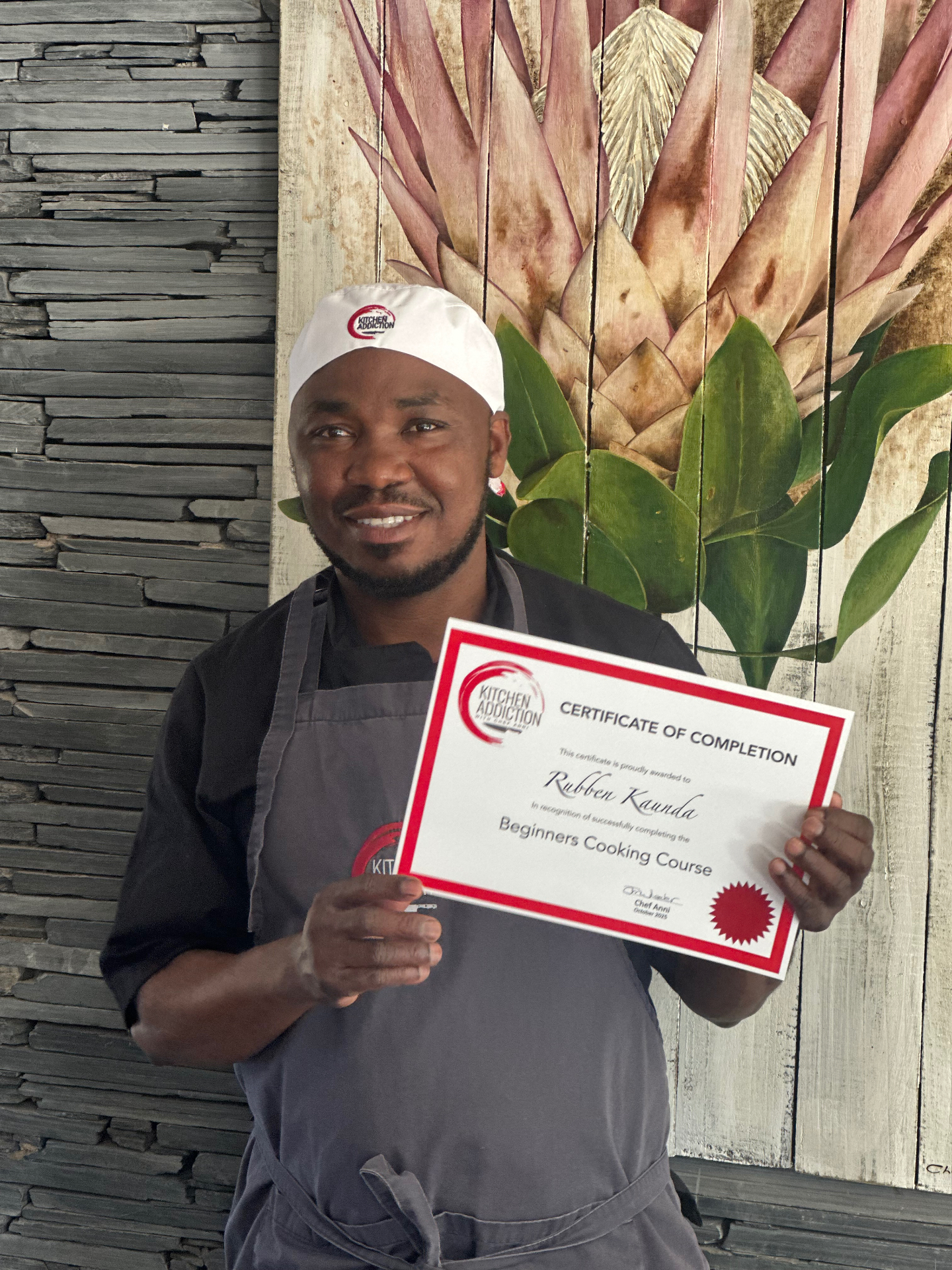 Guests cooking at a Kitchen Addiction class